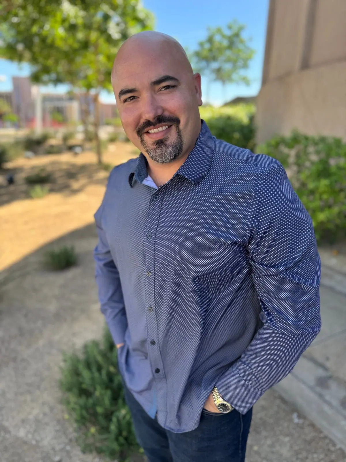 Drew Boyer, owner of Henderson Junk Solutions, smiling outdoors in Henderson, NV