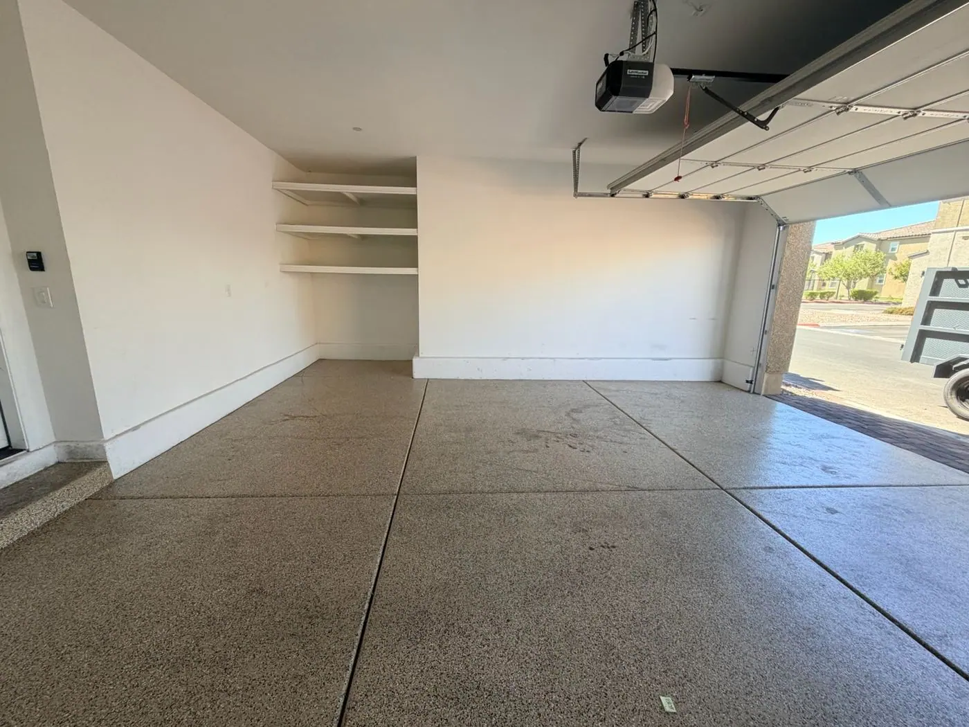 Same Cadence garage cleared and swept after an eviction cleanout by Henderson Junk Solutions